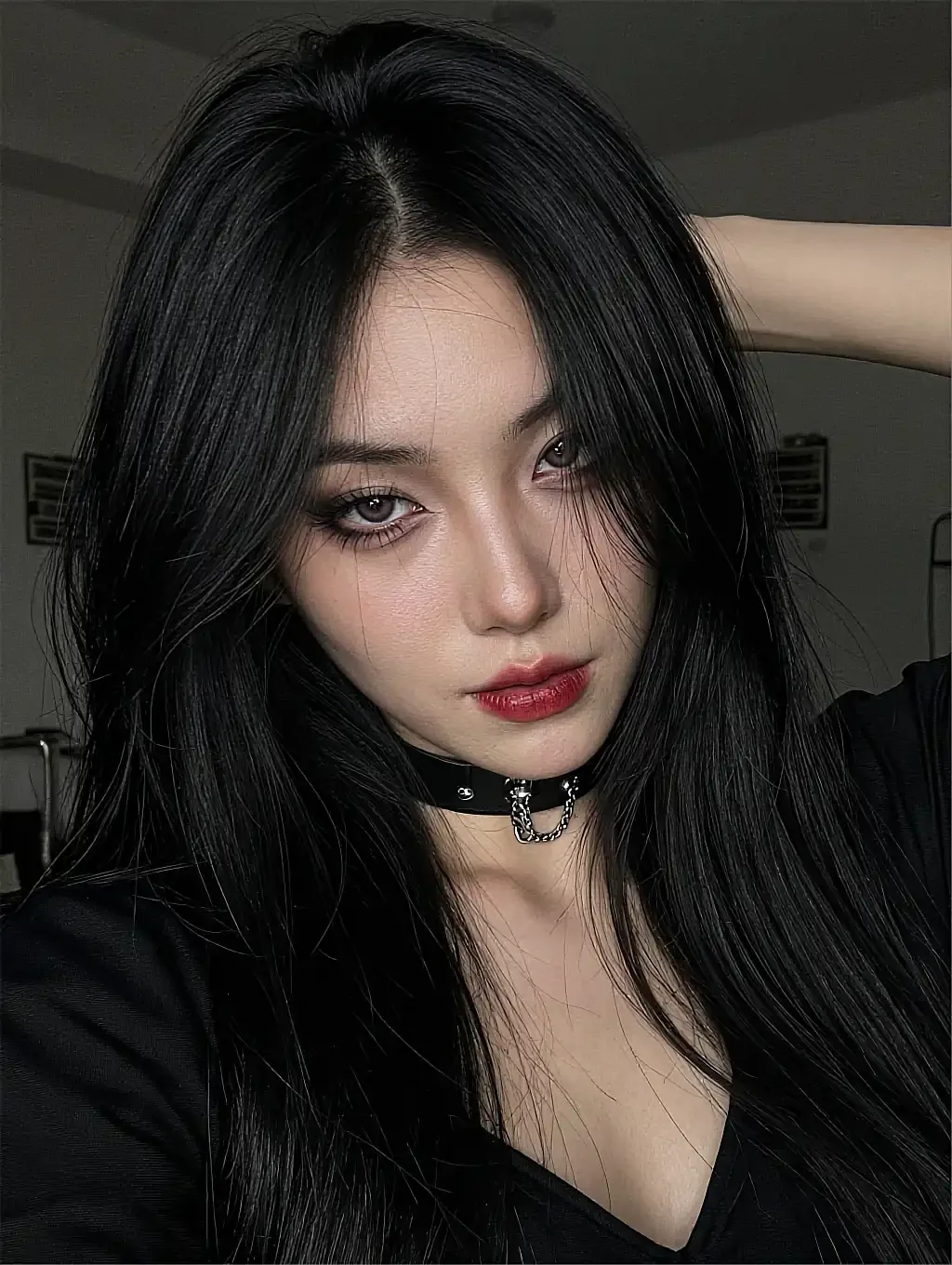 Fictional AI character with dark hair and a choker in near-black surroundings, shown as a remixed custom preset